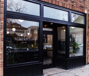 storefront blackblue vintage clothing store
