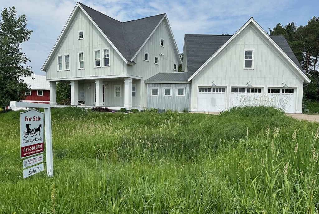 selling your home for sale sign carriage realty